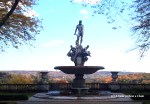 The Fountain of Oceanus at the front of the Rockefeller Estate, with a view of the foliage in Hudson Valley behind it.