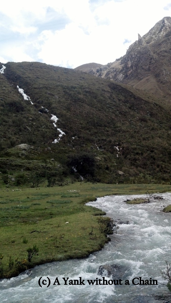 The hike began with a long walk along a winding river in a valley
