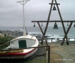 A ship and bells outside Neruda's Isla Negra home, indicative of his love of nautical life