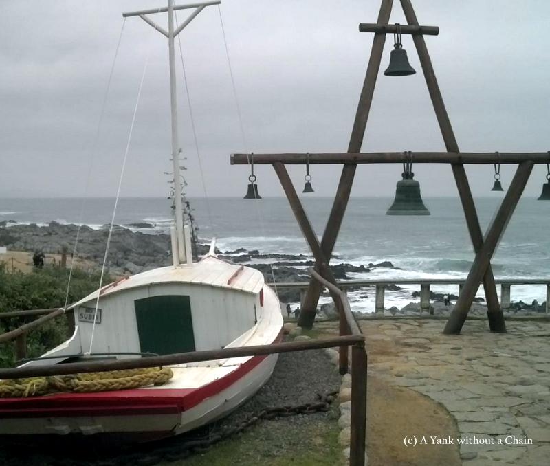 A ship and bells outside Neruda's Isla Negra home, indicative of his love of nautical life