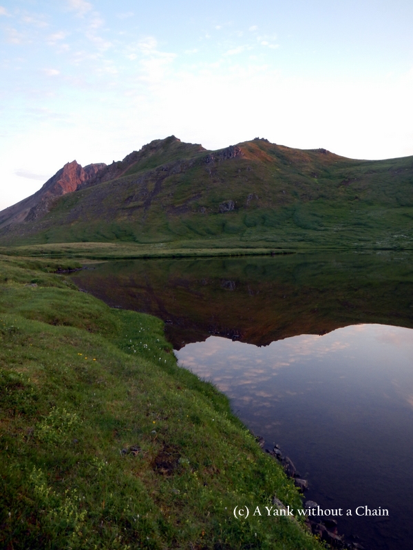 A lake between mountain peaks between Brunavik and Bakkagerdi