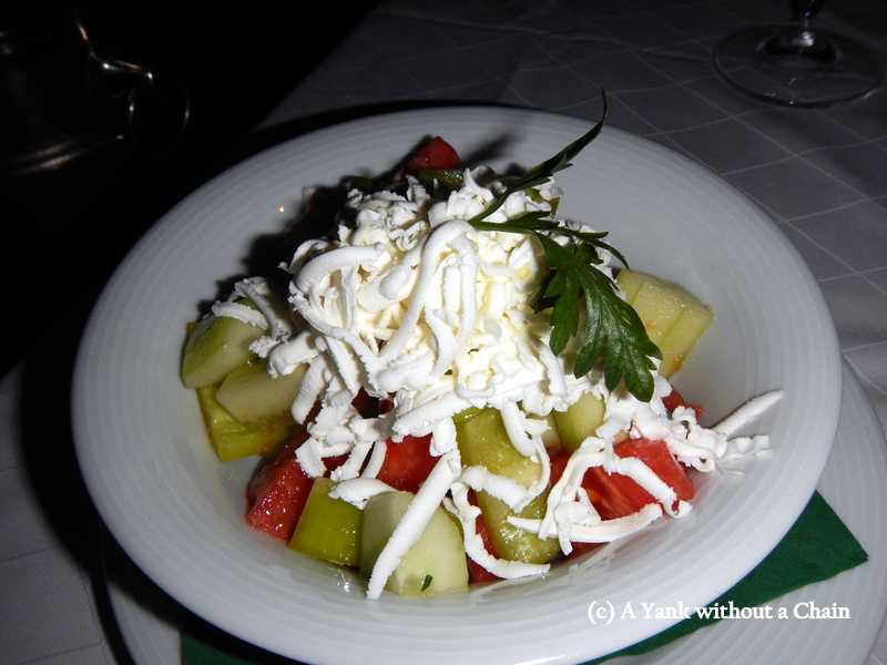 Shopska salad - cucumbers, tomatoes, and brined cheese - a classic, delicious Serbian dish