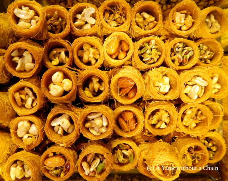 Some Turkish desserts made of honey and nuts at the spice market in Istanbul