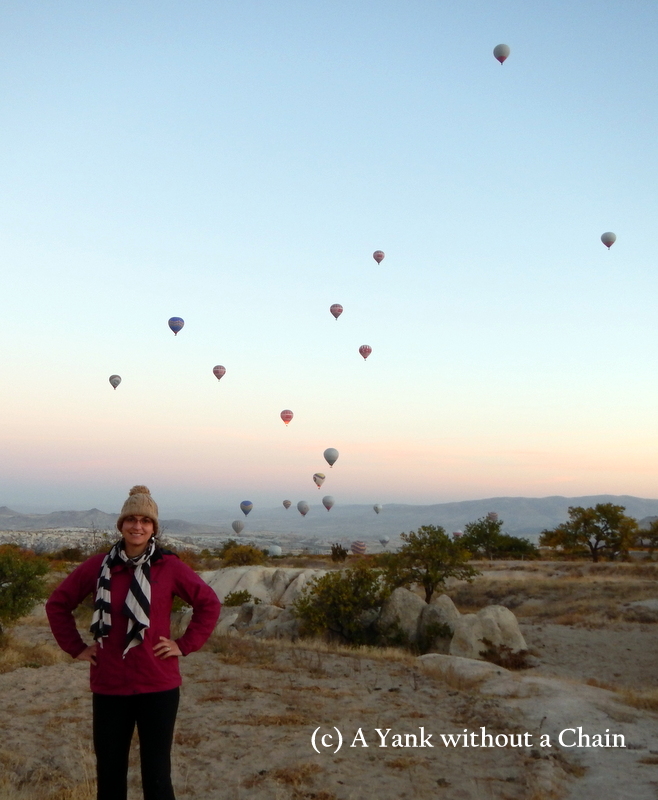 The balloons rise along with the sunset in Cappadocia