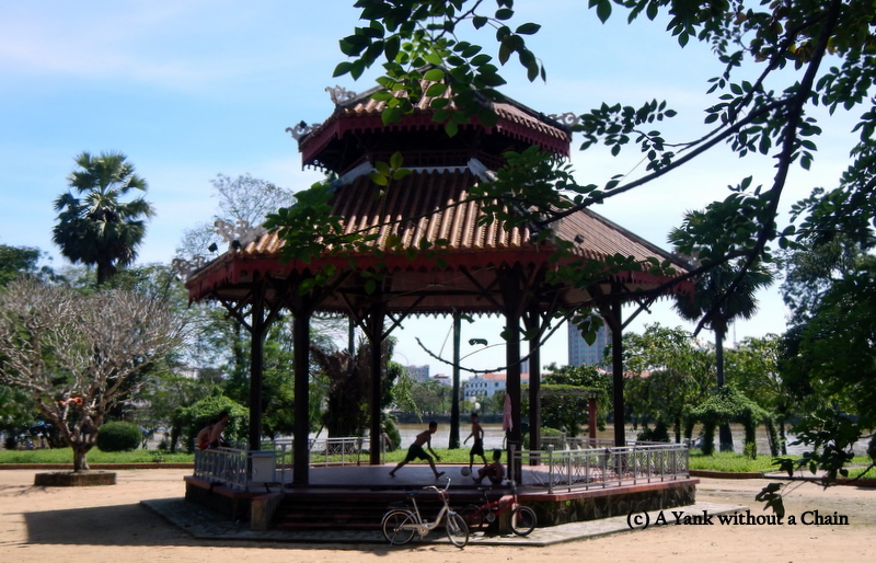Boys playing soccer in a pagoda in Hue
