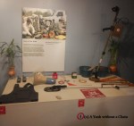 A display showing how volunteers are cleaning up the UXOs and educating people about them
