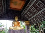 A sitting Buddha at Vat Xieng Thong in Luang Prabang