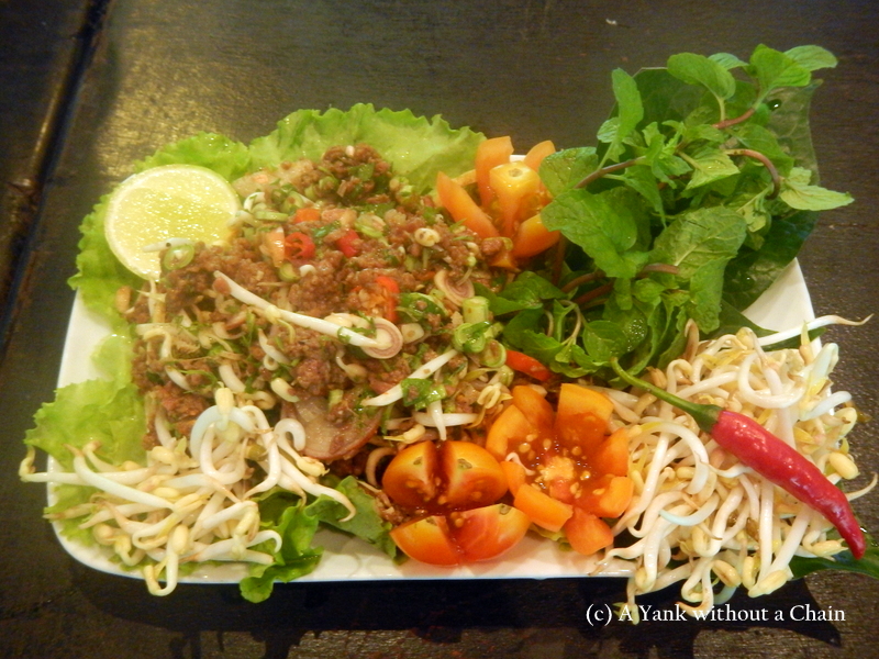 Laap - a traditional Lao dish which means "good luck" - made from buffalo meat and minced herbs