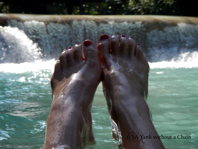 Bathing in a pool at the bottom of the Kuang Si falls