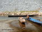 A man bathing just outside the Kong Lor cave