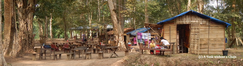 A woman and her child on the far side of Kong Lor cave