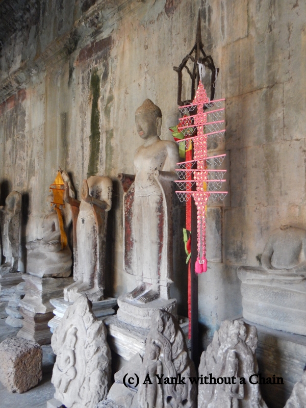 Buddha statues inside Angkor Wat