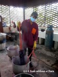 A man demonstrating how the silk is dyed