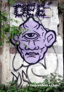 A cyclops painted on a wall in Chiang Mai