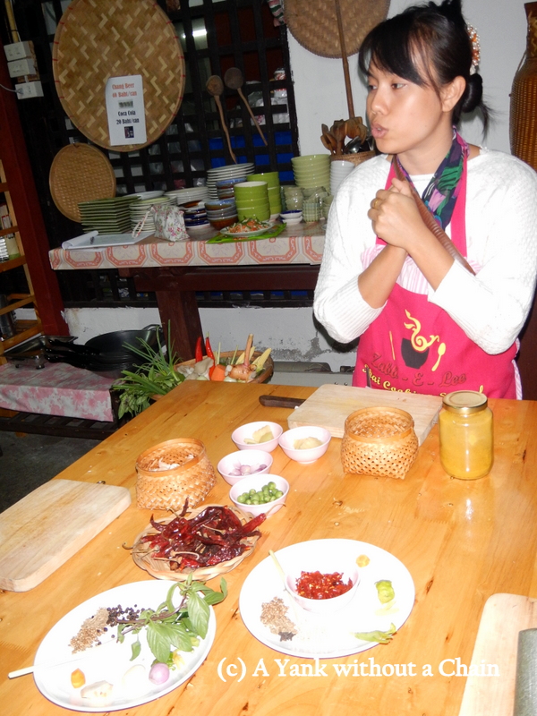 The owner and instructor of Zabb-e-Lee, Ann, explaining some ingredients