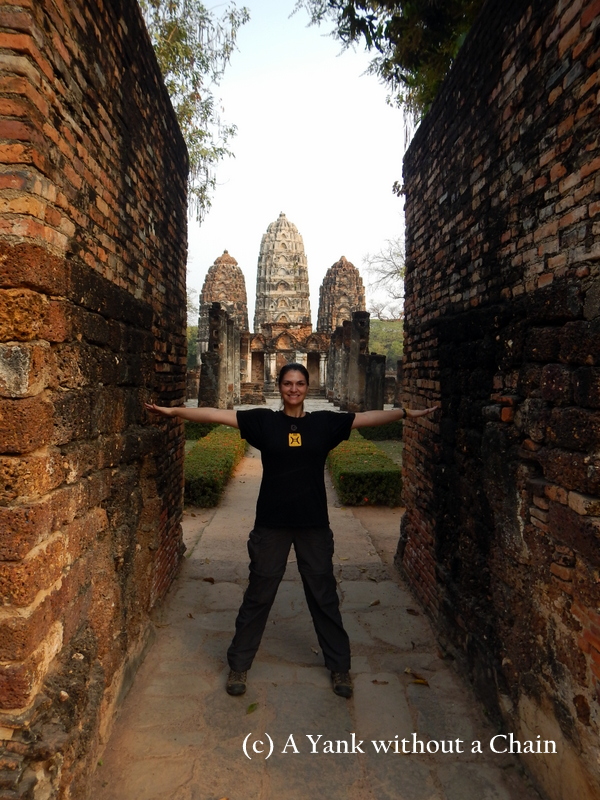 Standing at the entrance of Wat Si Sawai at Sukothai Historical Park