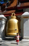 A baby and a bell at Wat Phra That Doi Suthep