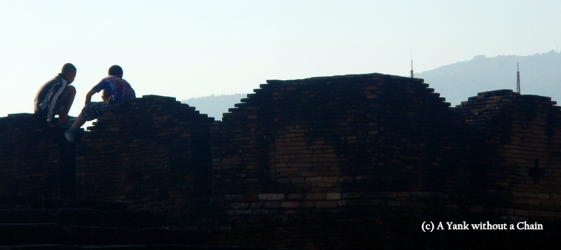Boys on top of Chiang Mai's old city wall