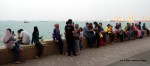 People in George Town, Penang waiting for sunset on the Strait of Malacca