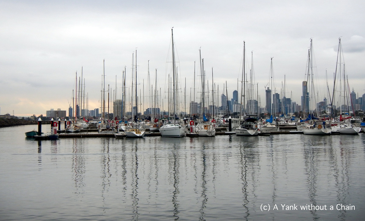 Boats at Port Phillip with the skyline of Melbourne