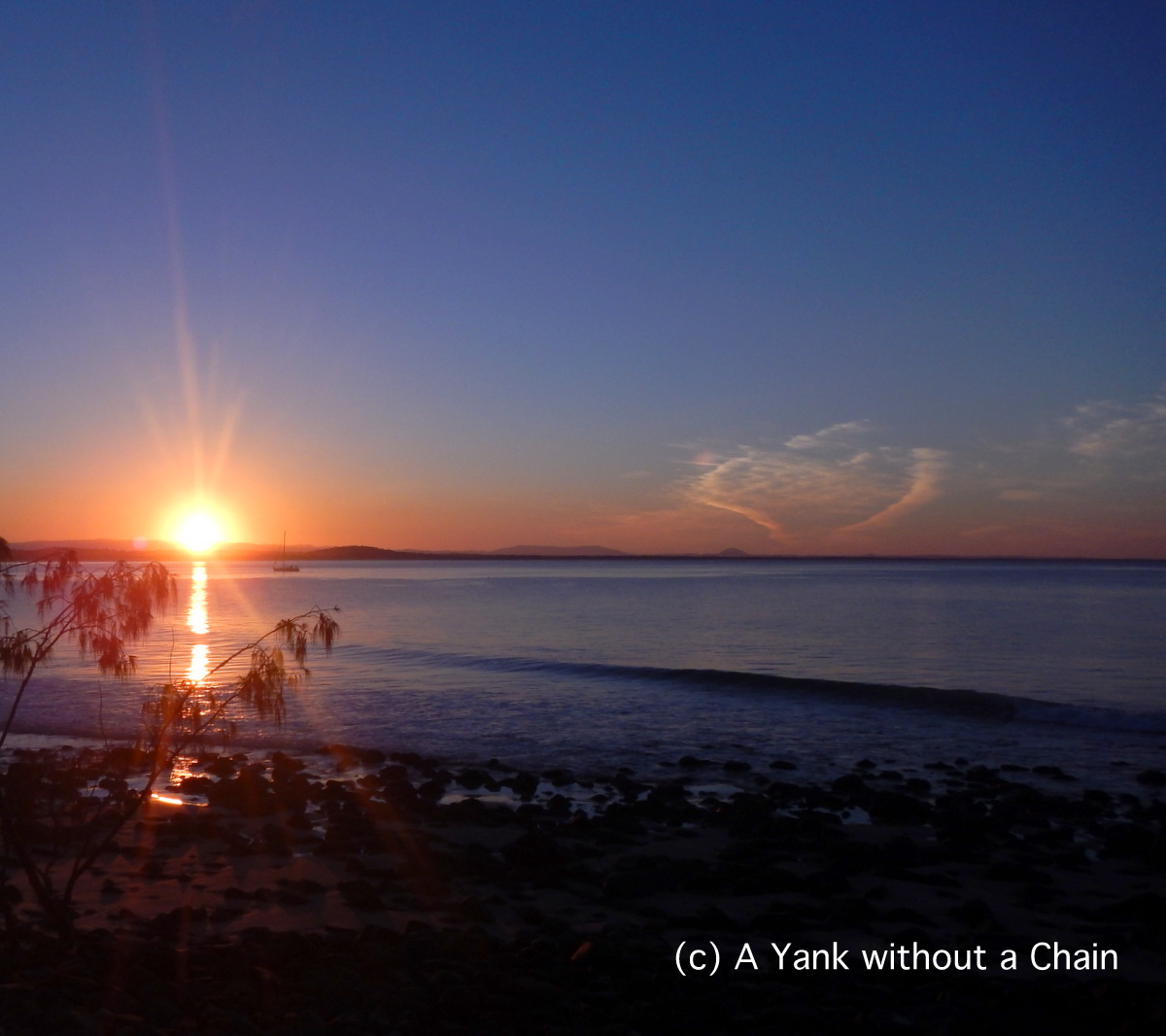 The start of sunset viewed from the coastal walking track of Noosa National Park