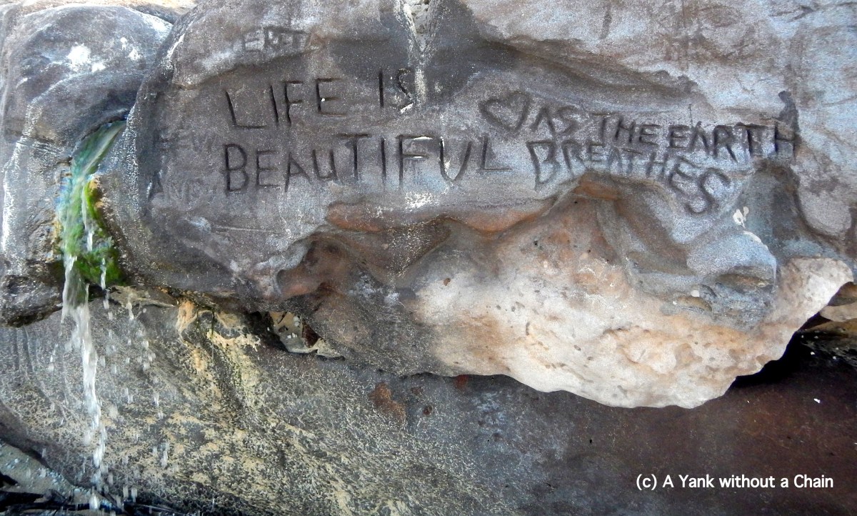 Natural graffiti on the rocks at Rainbow Beach